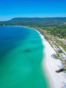 an aerial view of a beach and the ocean at Long Beach Resort Koh Rong in Koh Rong Island