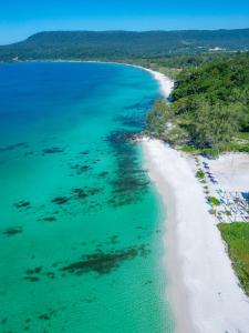 an aerial view of a beach and the ocean at Long Beach Resort Koh Rong in Koh Rong Island