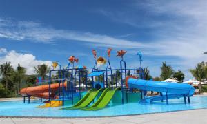 a water park with a water slide at Cam Ranh Riviera Beach Resort & Spa in Cam Ranh