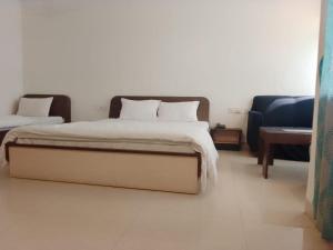 Postel nebo postele na pokoji v ubytování HOTEL MTM