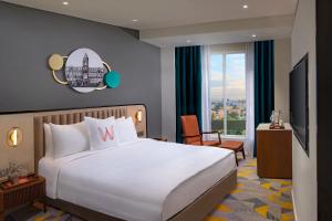 Postel nebo postele na pokoji v ubytování Welcomhotel by ITC Hotels, Cathedral Road, Chennai