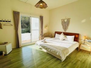 Llit o llits en una habitació de W24 Kenting Hostel II
