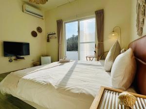 Postel nebo postele na pokoji v ubytování W24 Kenting Hostel II
