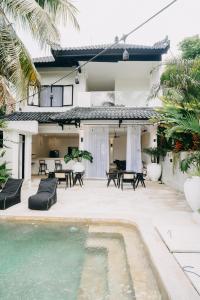 an image of a house with a swimming pool at Casa Art Ubud in Ubud