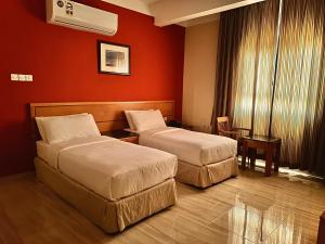 Postel nebo postele na pokoji v ubytování Remal Ibri hotel