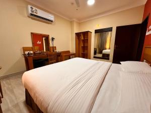 Postel nebo postele na pokoji v ubytování Remal Ibri hotel