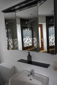 Koupelna v ubytování Ferienwohnung "Seaside" + 19 fotografií