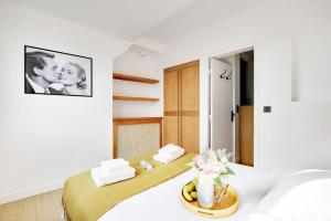 Postel nebo postele na pokoji v ubytování Amazing apartments in Châtelet - Rivoli