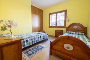 Postel nebo postele na pokoji v ubytování Preciosa casa en Sa Tuna