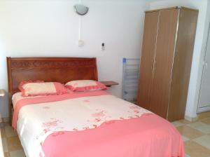 ZZK Flats - Grand Baie Beach tesisinde bir odada yatak veya yataklar