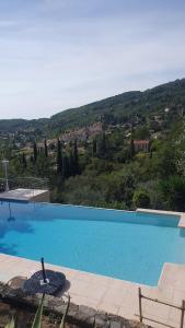 Bazén v ubytování Studio 30 M² avec piscine et vue exceptionnelle nebo v jeho okolí