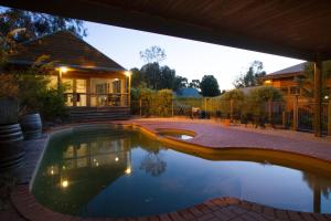 a swimming pool in the backyard of a house at Glen Erin at Lancefield in Rochford