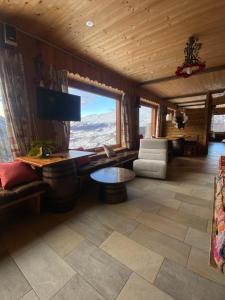 Posezení v ubytování Edelweiss Hotel Champoluc