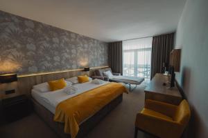 Voodi või voodid majutusasutuse Rodinný Hotel Hubert High Tatras toas +32 fotot
