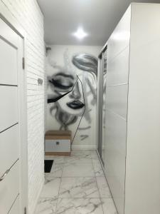 Ett badrum på New Marine Apartment