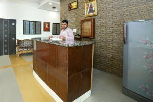 The lobby or reception area at Super OYO Hotel Kalindi