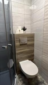 Kúpeľňa v ubytovaní Apartamenty Cichy Kącik