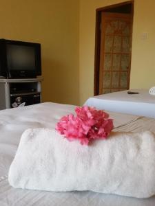 Postel nebo postele na pokoji v ubytování Syifa Homestay