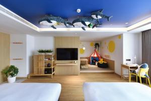 Ліжко або ліжка в номері Fullon Poshtel - Kaohsiung
