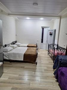Postel nebo postele na pokoji v ubytování GUEST HAUSE & HOSTEL 15a
