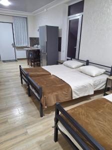 Postel nebo postele na pokoji v ubytování GUEST HAUSE & HOSTEL 15a