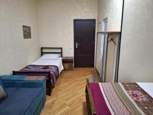 Postel nebo postele na pokoji v ubytování GUEST HAUSE & HOSTEL 15a