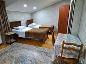 Postel nebo postele na pokoji v ubytování GUEST HAUSE & HOSTEL 15a
