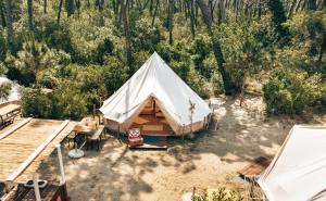 an overhead view of a tent in the woods at Pigna Felice Punta Ala in Punta Ala