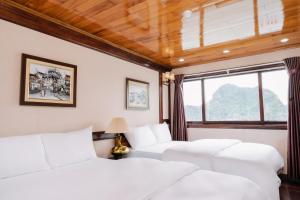 En eller flere senge i et værelse på Daiichi Boutique Cruise + 51 billeder