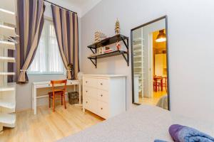 Ένα ή περισσότερα κρεβάτια σε δωμάτιο στο Central Cityscape Retreat by NW +17 φωτογραφίες