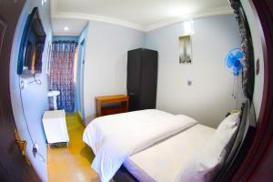 Posteľ alebo postele v izbe v ubytovaní Remzy Hotel & Suites, Olomore
