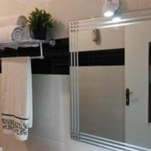 a bathroom with a mirror and a sink at Appart Hotels Wouroud in Tangier +96 photos