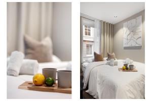2 imágenes de un dormitorio con 2 camas y fruta en una mesa en Renovated jan 24 - Queen beds - Behind Bryggen, en Bergen