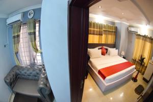 Posteľ alebo postele v izbe v ubytovaní Remzy Hotel & Suites, Olomore