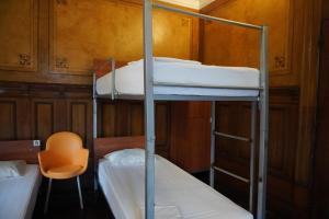 Cama ou camas em um quarto em HI Guimaraes - Pousada de Juventude