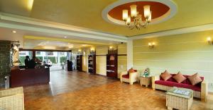 Posezení v ubytování Hotel C7 Munnar