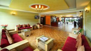 Posezení v ubytování Hotel C7 Munnar