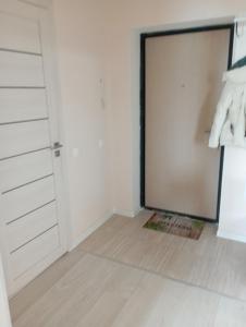 a room with a closet and a door at 1-но комнатная квартира в центре Астаны ЖК Sezim Qala 4 in Astana +19 photos
