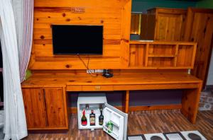 TV a/nebo společenská místnost v ubytování Hotel Kamana
