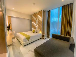 Krevet ili kreveti u jedinici u okviru objekta Facade Hotel by Azana
