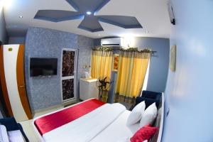 Posteľ alebo postele v izbe v ubytovaní Remzy Hotel & Suites, Olomore