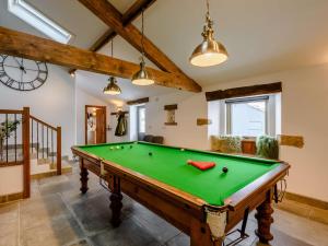 a living room with a pool table in it at 5 Bed in Ingleton 90546 in Burton in Lonsdale