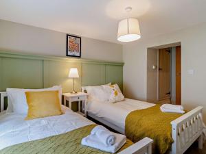 Katil atau katil-katil dalam bilik di 3 Bed in Fakenham 90681