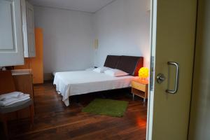 Cama ou camas em um quarto em HI Guimaraes - Pousada de Juventude