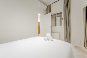 Llit o llits en una habitació de NY Style Apt 5p en San Mateo centro Chueca-Malasana