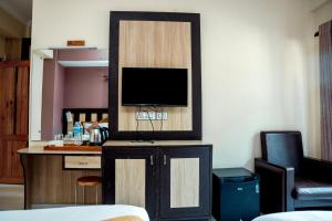 Kuchyň nebo kuchyňský kout v ubytování Hotel Kamana