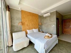 Letto o letti in una camera di Check-in Resort Koh Larn