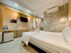 TV o dispositivi per l'intrattenimento presso Check-in Resort Koh Larn