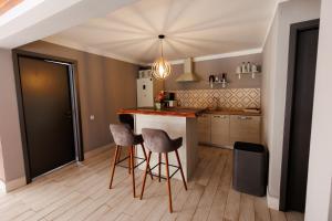 Kuchyň nebo kuchyňský kout v ubytování Cabana Dor De Munte