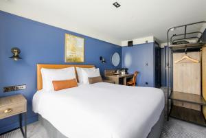 Postel nebo postele na pokoji v ubytování Ropewalks Hotel